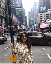 Kira Omelchenko posing on busy New York City street