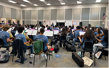 Students rehearsing in practice room