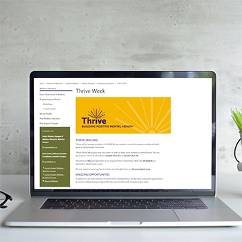 Thrive Week webpage on laptop