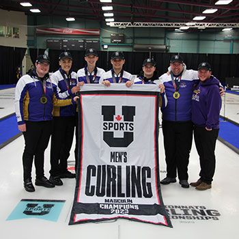 Men's curling celebrates national championship.